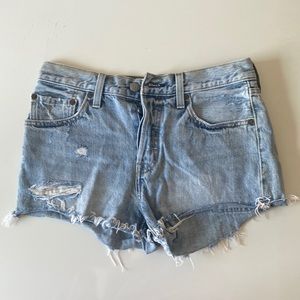 Levi’s 501 light wash distressed denim shorts